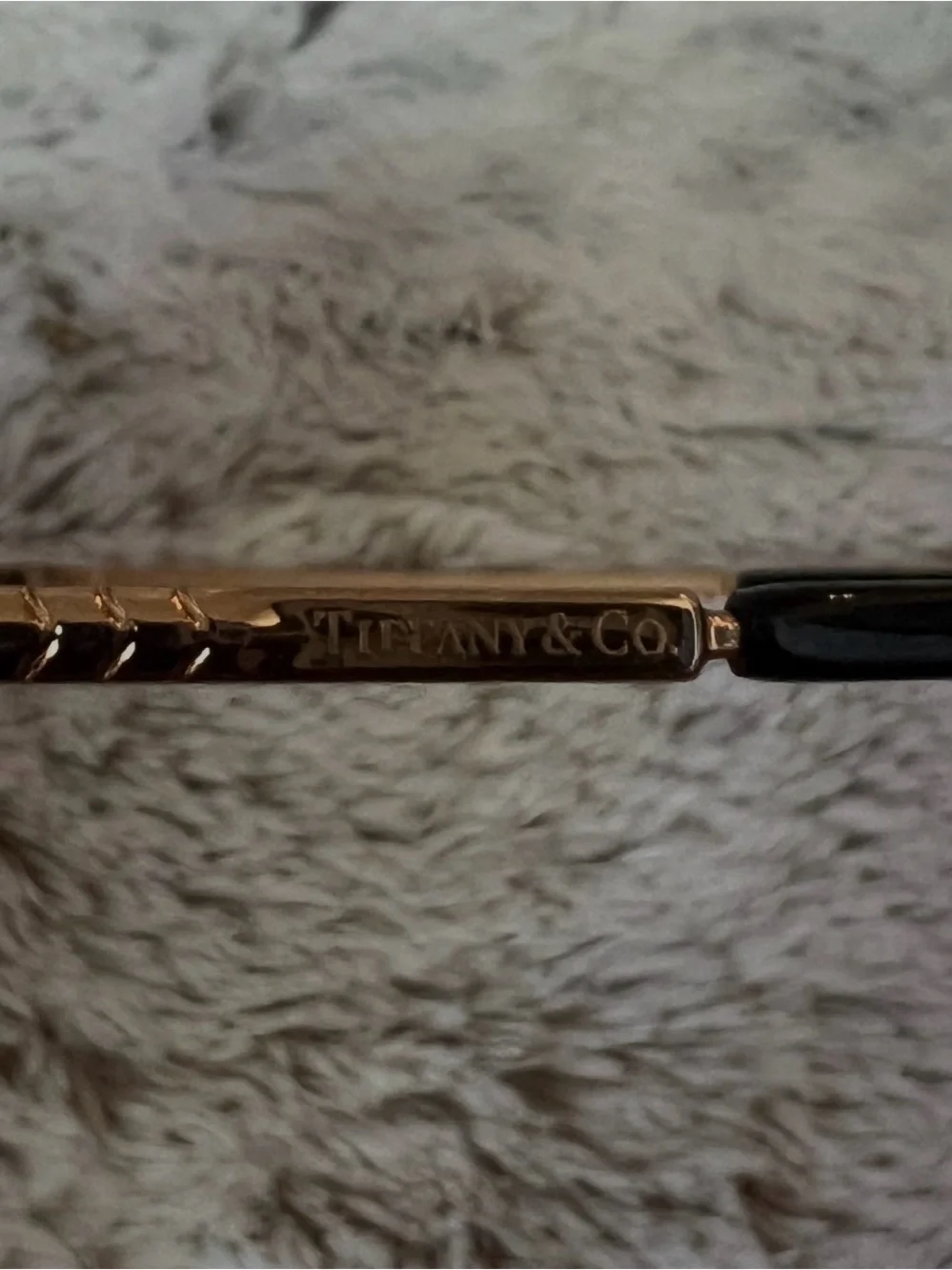 Women's Tiffany and Co gold metal and black cat eye frames